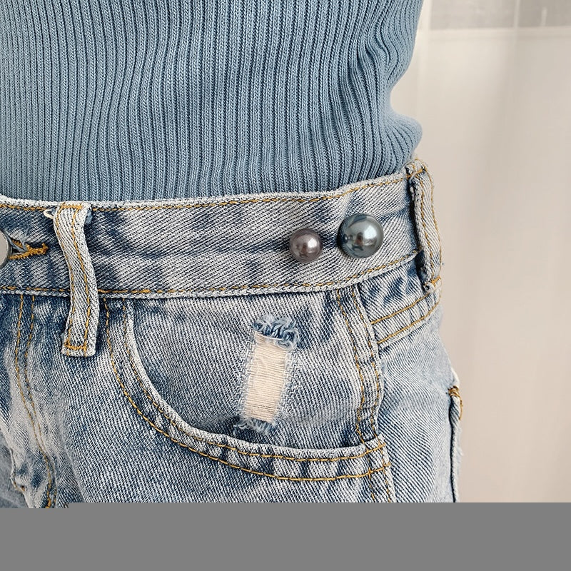 A stylish waistband clip brooch made of alloy with artificial pearls, measuring 3cm, perfect for enhancing outfits.