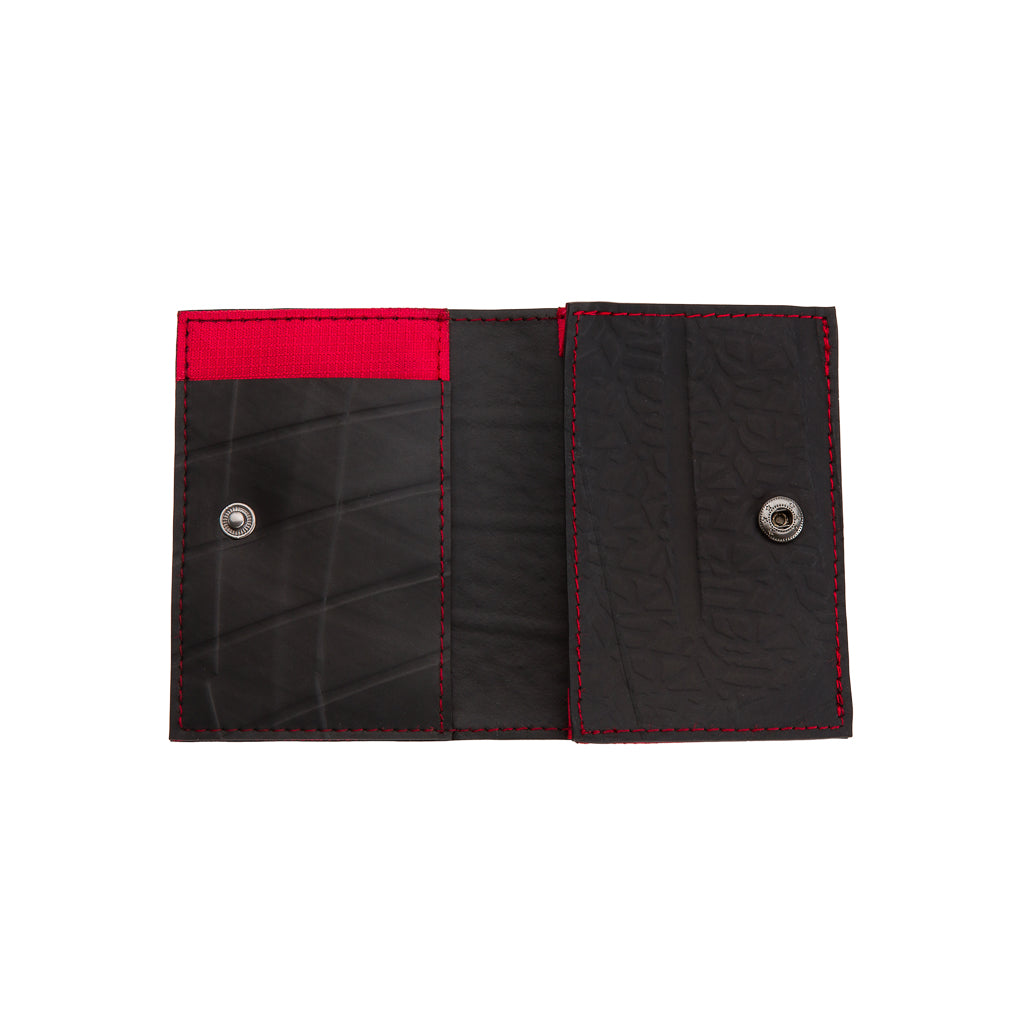 Walter Vegan Slimline Card Holder made from recycled rubber, featuring three card compartments and available in multiple colors.