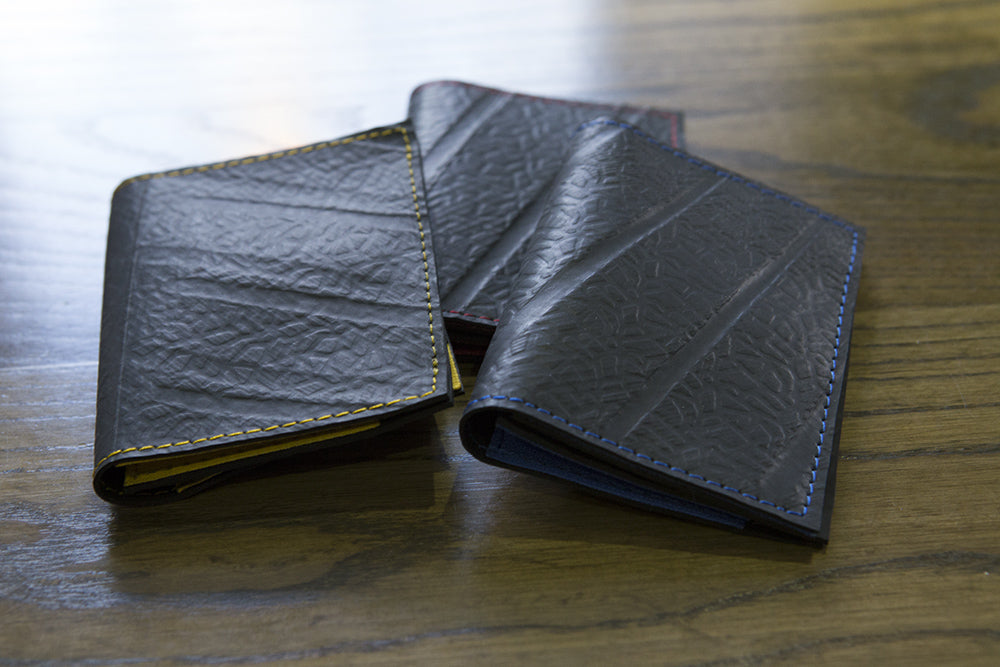 Walter Vegan Slimline Card Holder made from recycled rubber, featuring three card compartments and available in multiple colors.