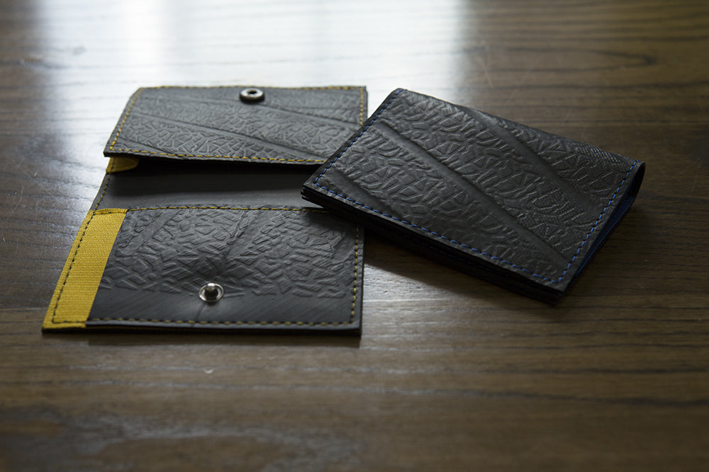 Walter Vegan Slimline Card Holder made from recycled rubber, featuring three card compartments and available in multiple colors.