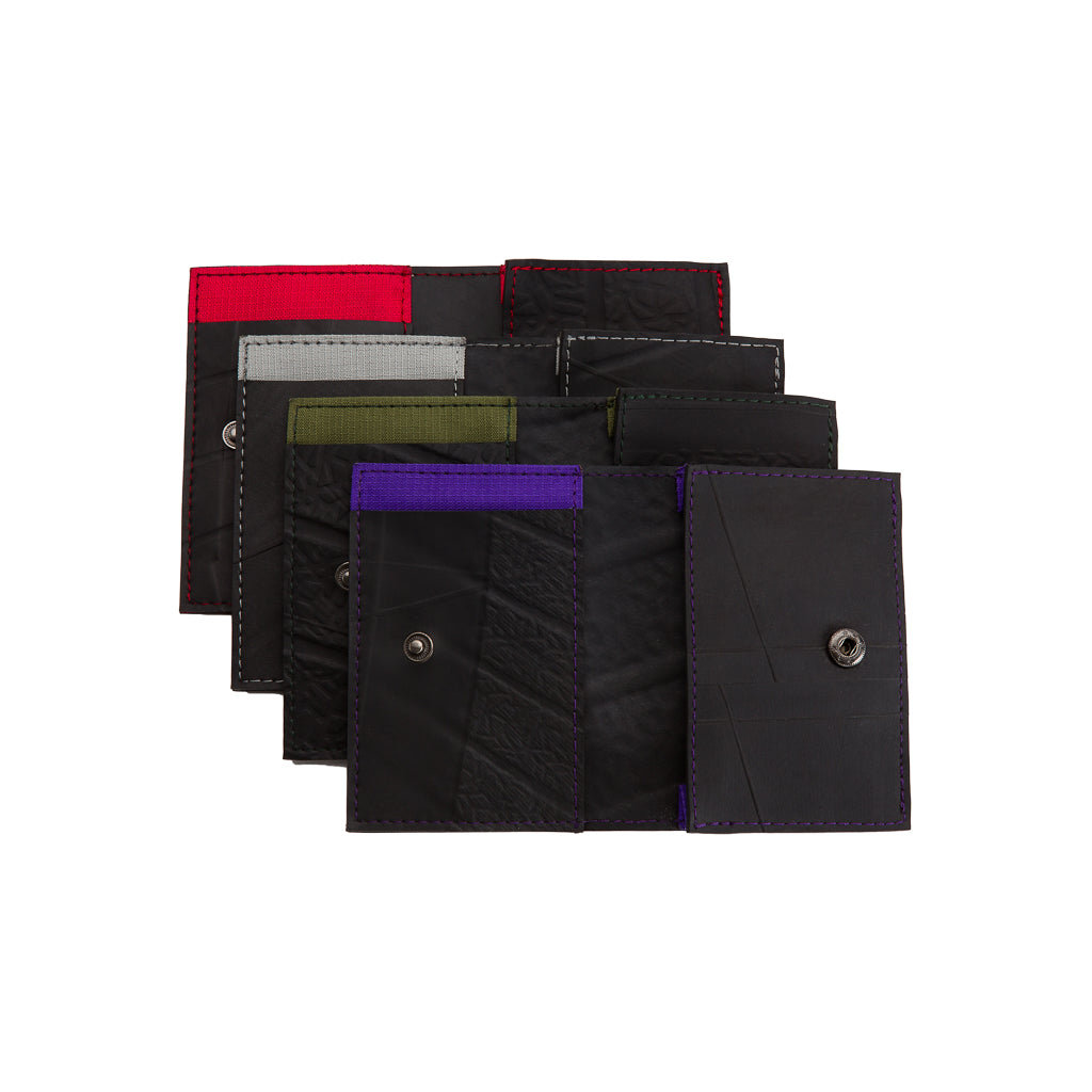 Walter Vegan Slimline Card Holder made from recycled rubber, featuring three card compartments and available in multiple colors.