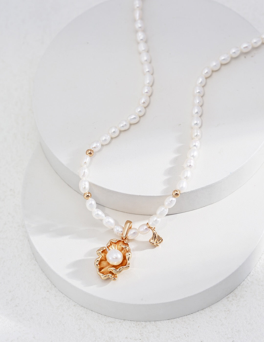 Wave Design Pearl Adjustable Necklace featuring natural pearls and gold vermeil, elegantly crafted for a luxurious look.