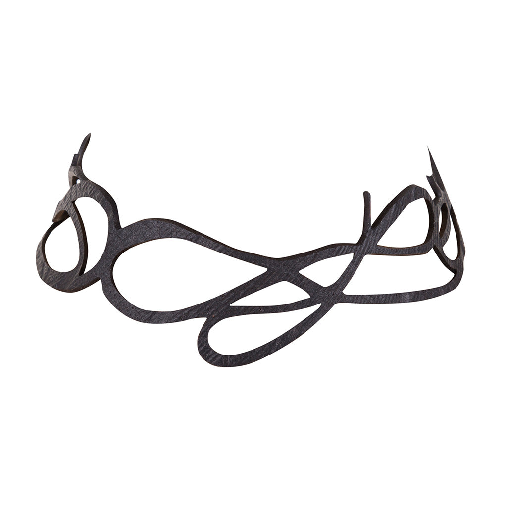 Wave Elegant Inner Tube Choker made from recycled rubber, featuring a sleek design with adjustable buttons and a luxurious gift box.