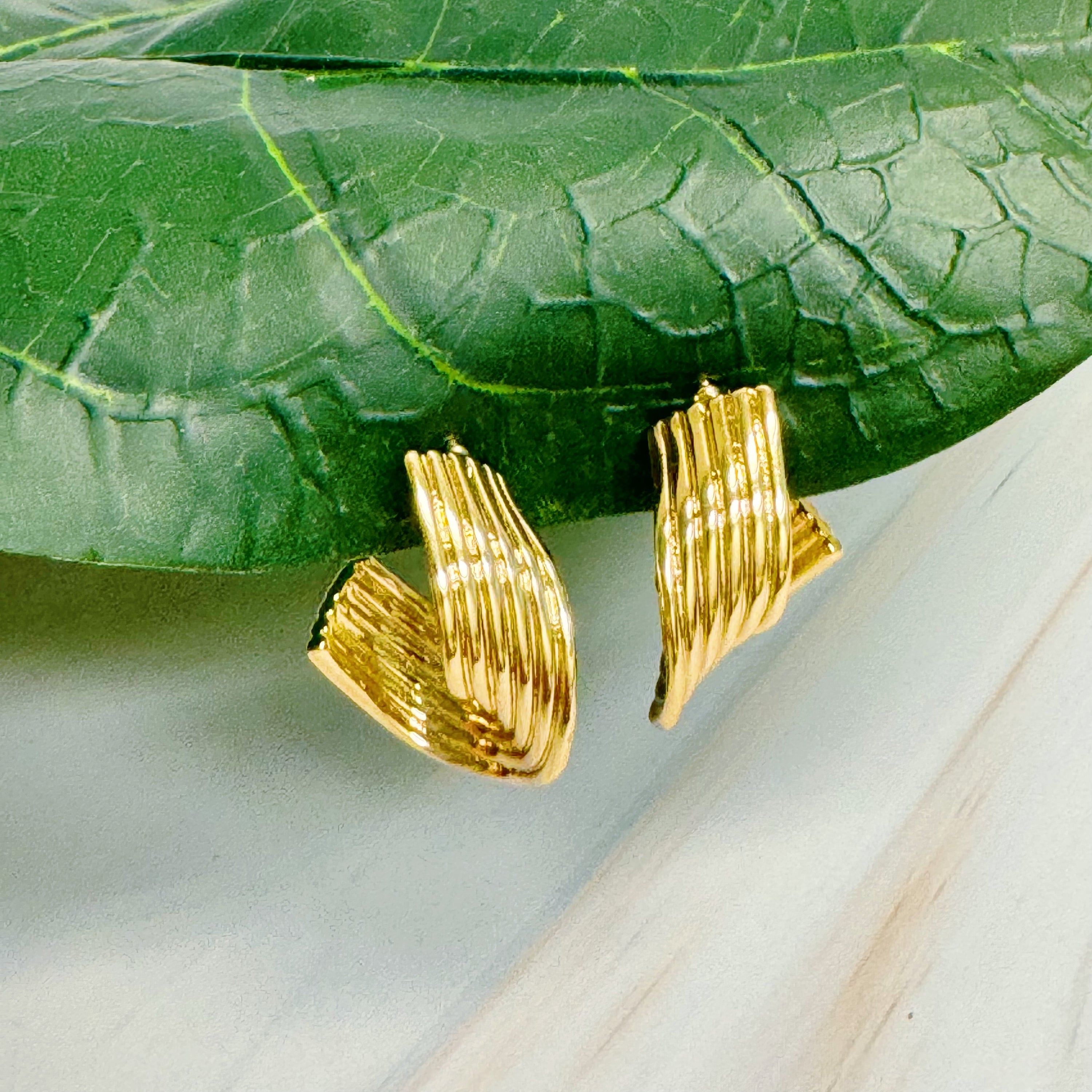 Elegant Wave Twisted Hoop Earrings in 18k gold plated brass with intricate wave design, perfect for any occasion.