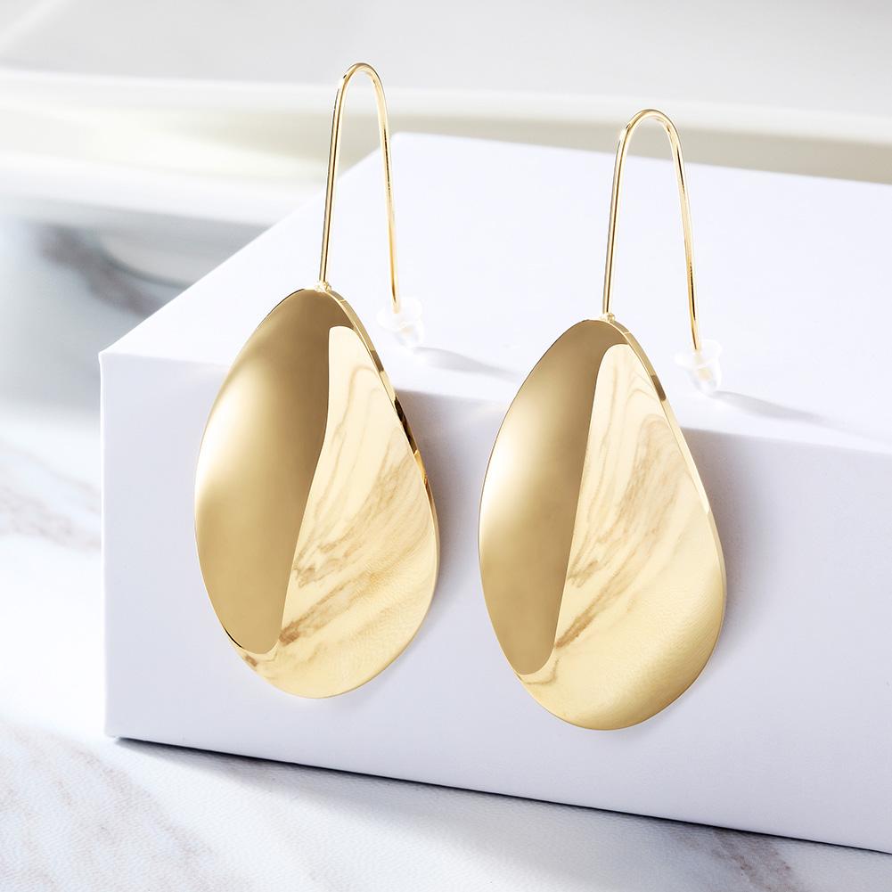 Elegant Waved-Sharp Leaf Earrings made of stainless steel with gold plating, showcasing a unique leaf design.