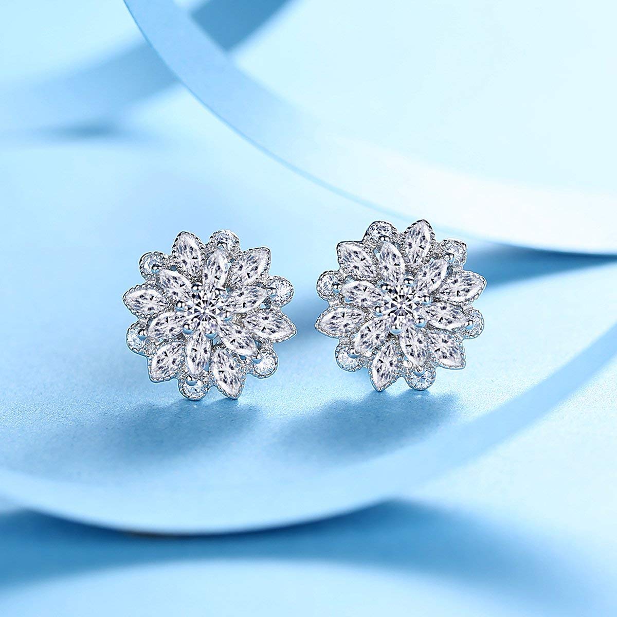 Elegant White Crystal Flower Earrings featuring AAAAA princess-cut crystals set in 14K white gold plating.