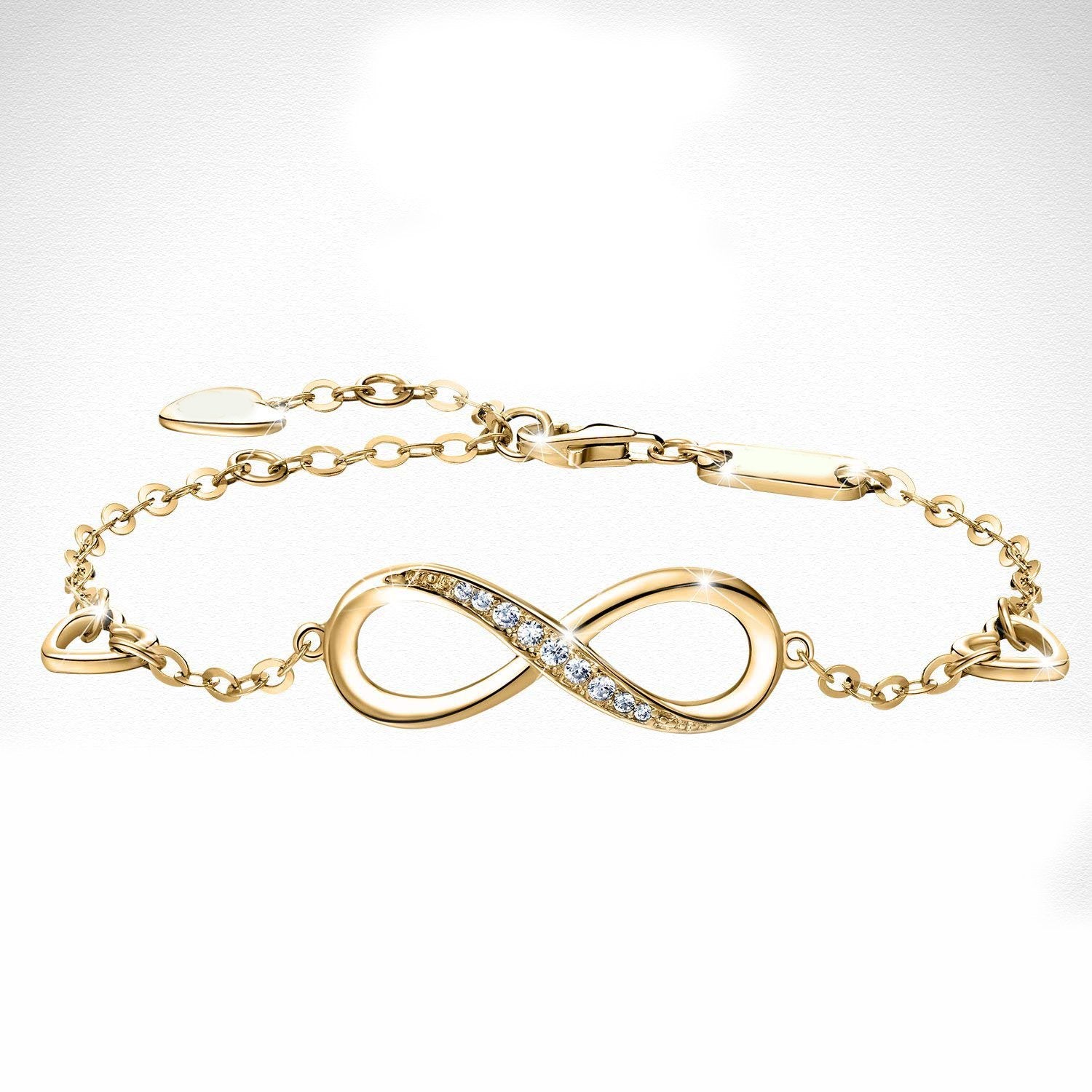 Elegant White Elements Infinite Pendant Chain Bracelet featuring 14K gold plating and a stunning infinity pendant with white elements.