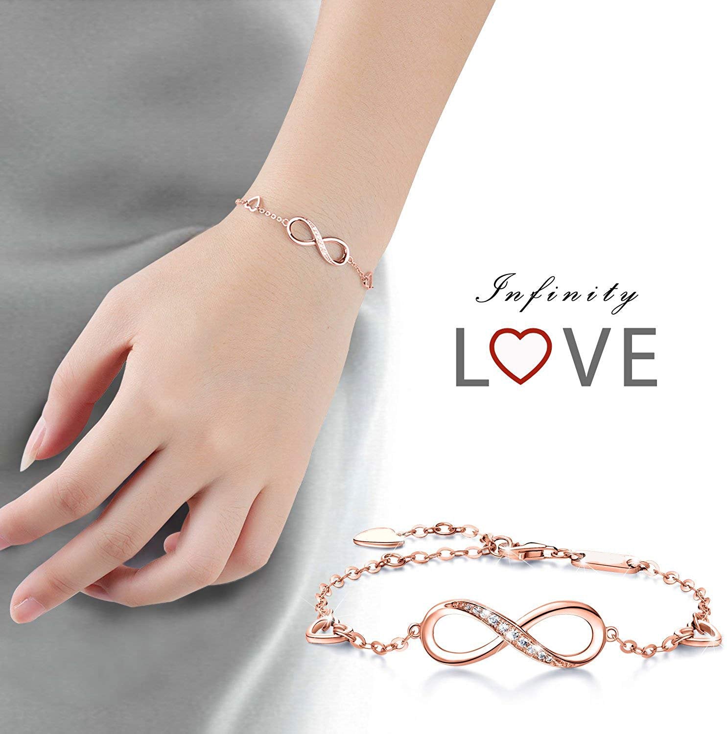 Elegant White Elements Infinite Pendant Chain Bracelet in 14K Rose Gold with a link chain and lobster clasp.