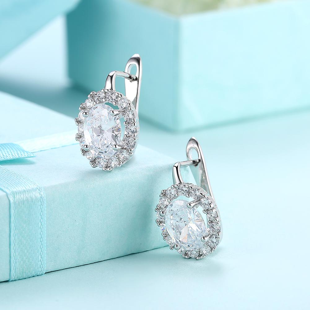 Elegant White Elements Leverback Earrings in 18K white gold with certified crystals, showcasing a sophisticated design.