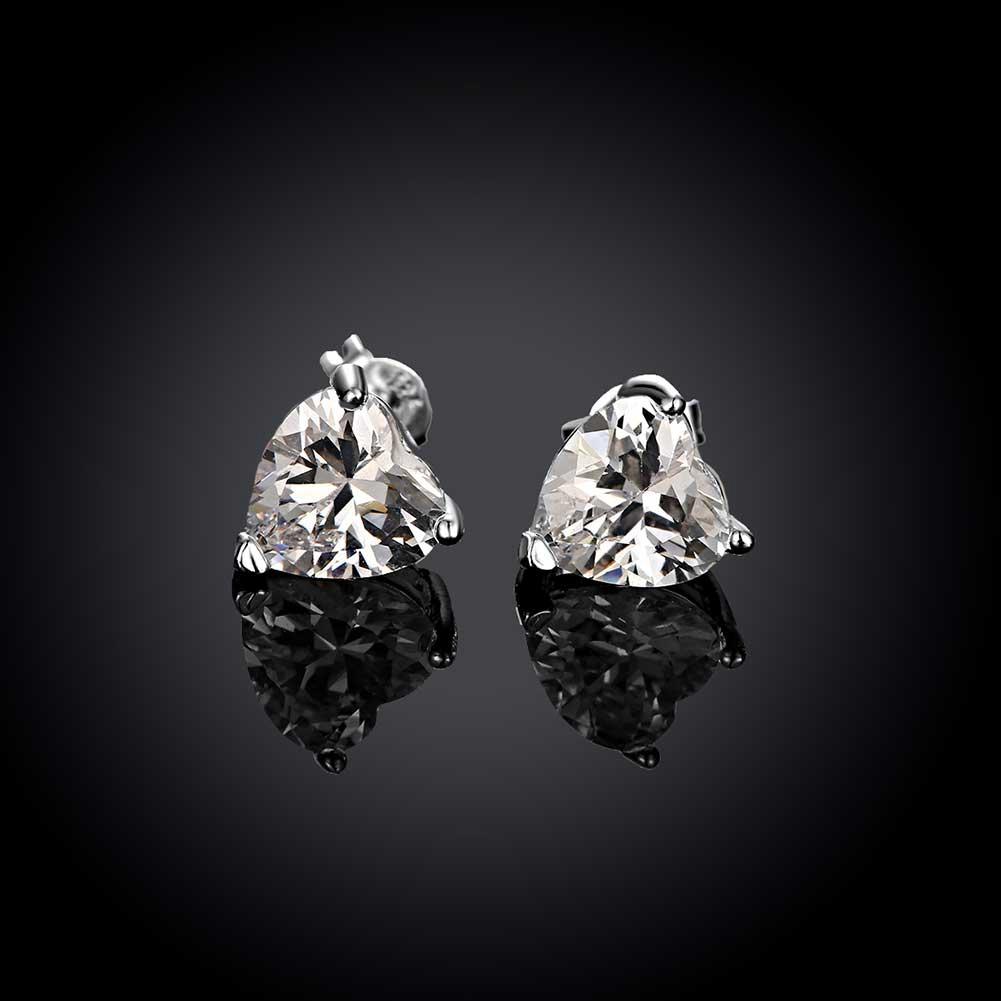 Elegant White Topaz Heart Stud Earrings in 14K White Gold Plating, showcasing a 6mm heart-shaped gemstone.