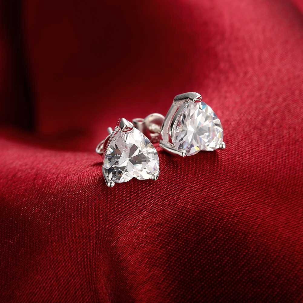 Elegant White Topaz Heart Stud Earrings in 14K White Gold Plating, showcasing a 6mm heart-shaped gemstone.