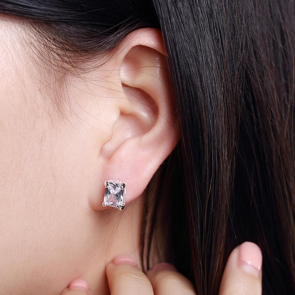 Elegant White Topaz Square Stud Earrings set in 14K white gold plating, showcasing a modern square design.