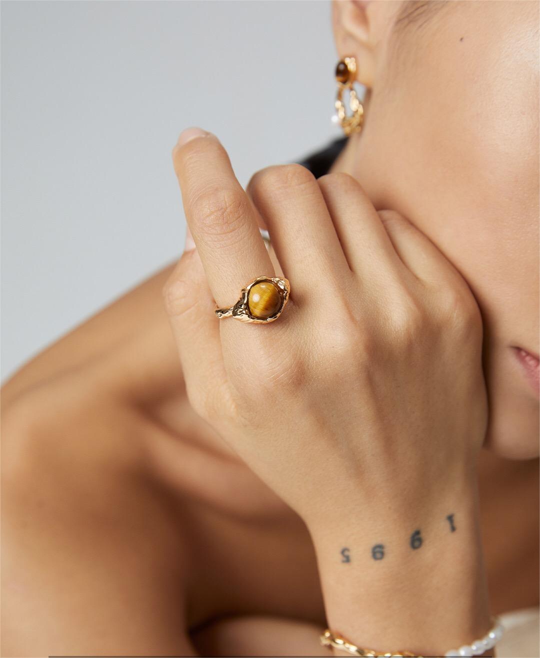 Wide Tiger Eye Stone Ring featuring a gold vermeil band and a large tiger eye gemstone, elegantly handcrafted.