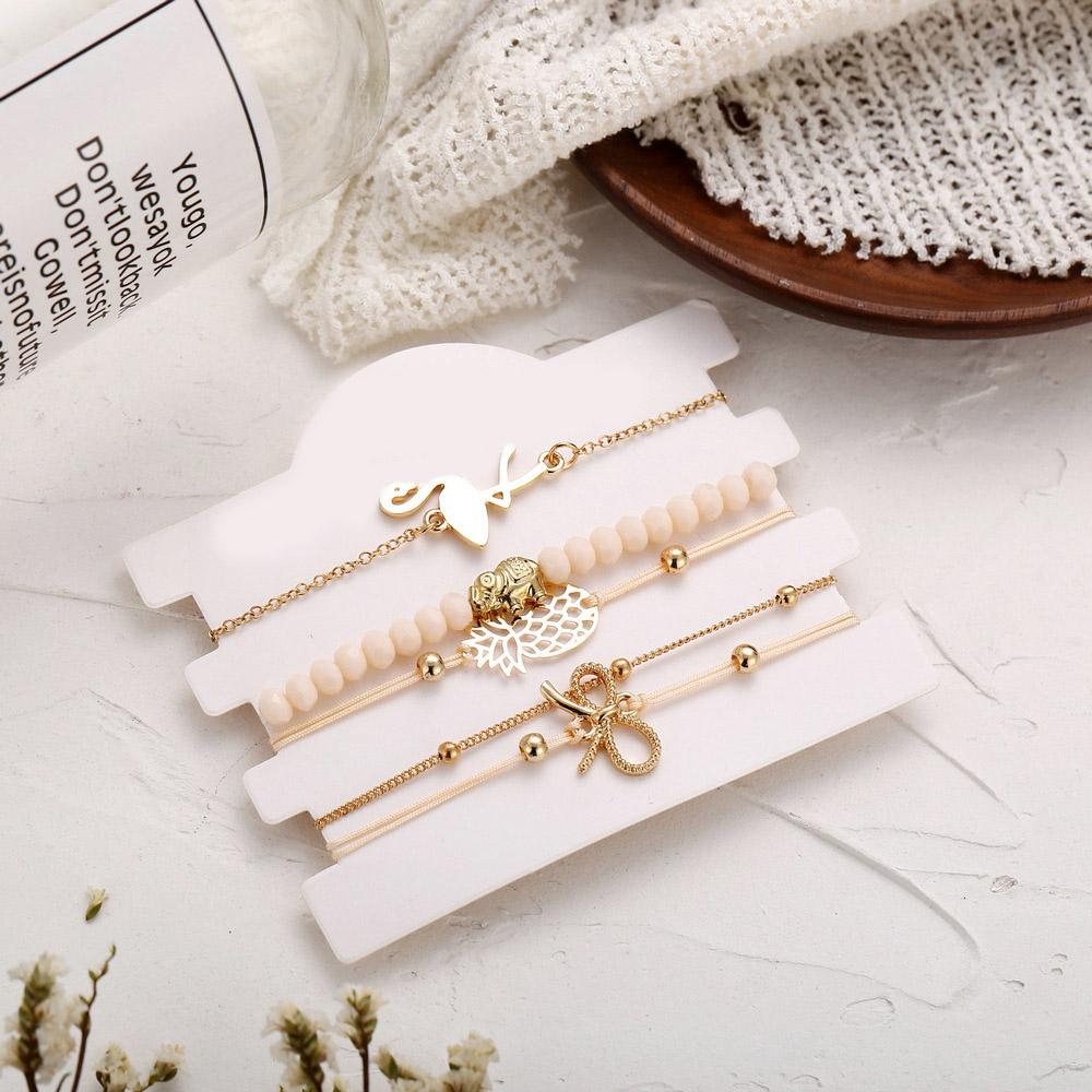 Wild Jungle Marble Stretch 5 Piece Bracelet Set featuring 14K rose gold plating and unique pineapple design, elegantly displayed.