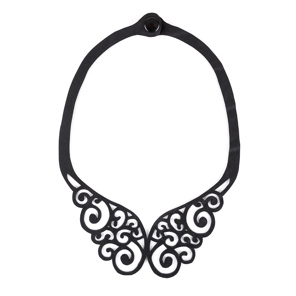 A beautifully handcrafted Wing Intricate Necklace made from upcycled inner tubes, featuring unique textures and patterns.