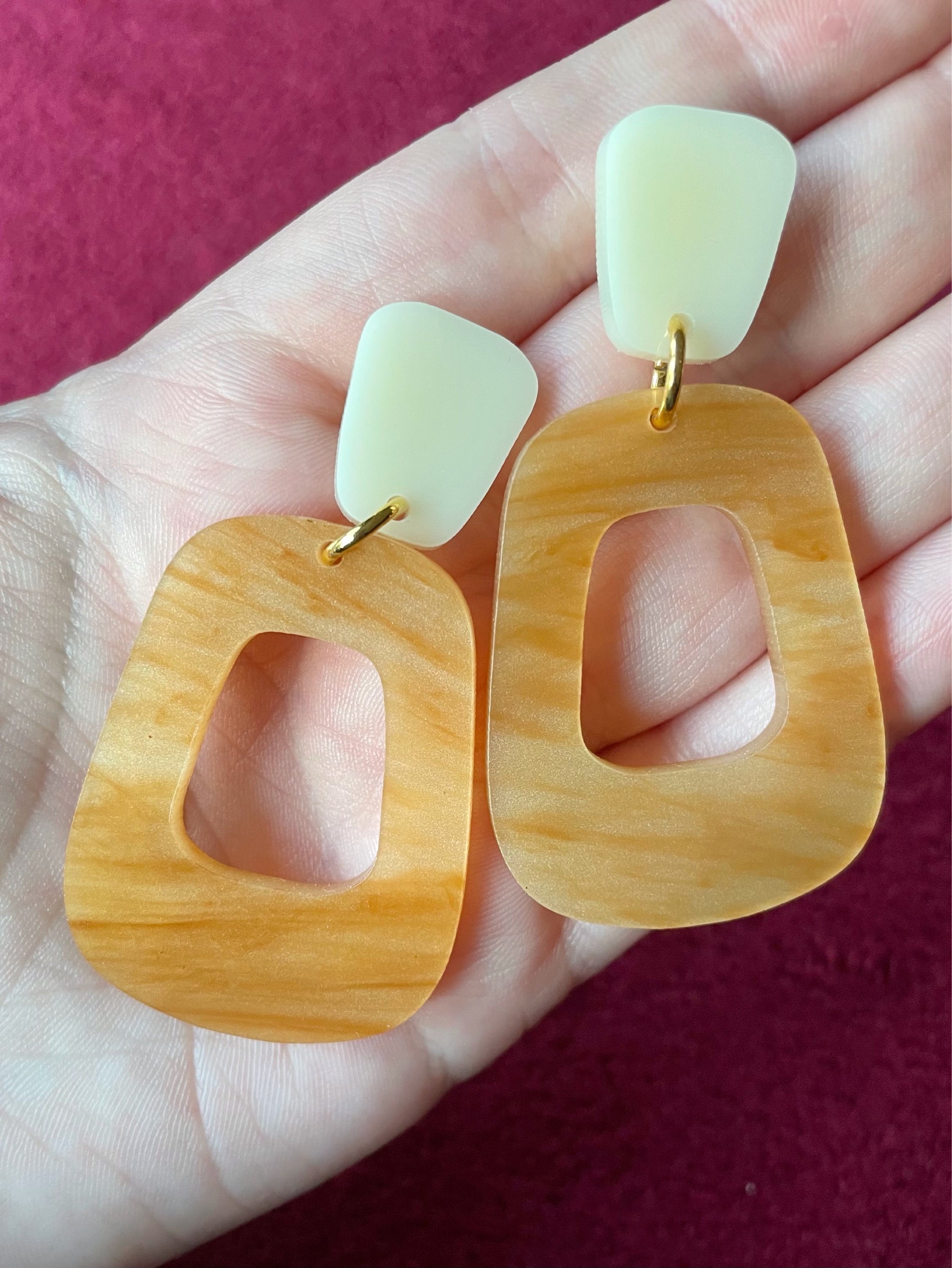 Winnie Earrings featuring caramel marble and ivory toppers, showcasing a stylish laser cut acrylic design.