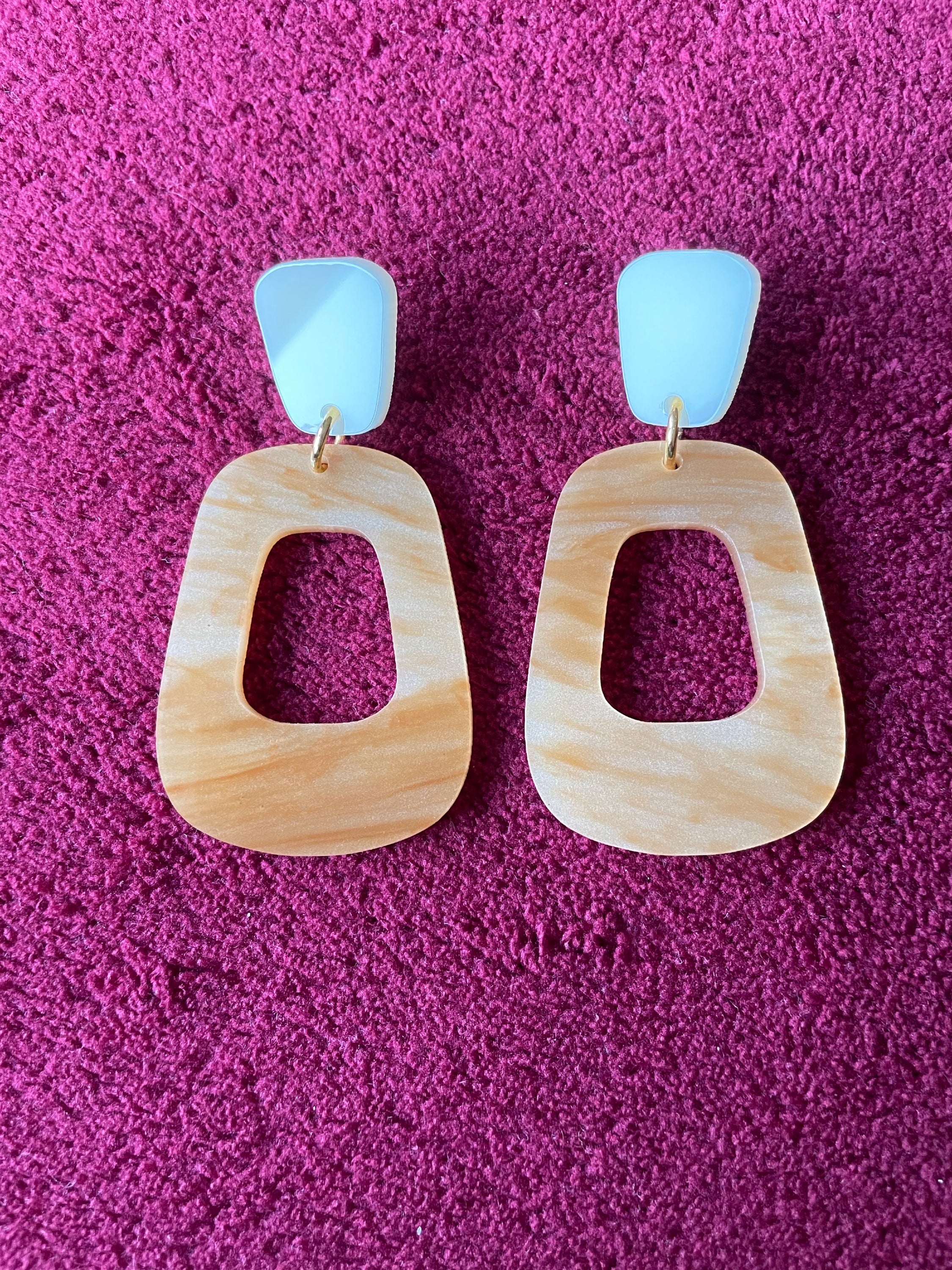 Winnie Earrings featuring caramel marble and ivory toppers, showcasing a stylish laser cut acrylic design.