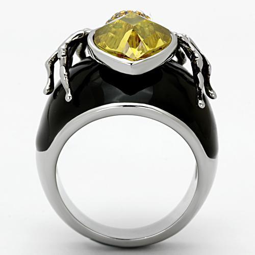 A beautiful women's stainless steel ring featuring high polish finish and sparkling cubic zirconia with topaz accents.