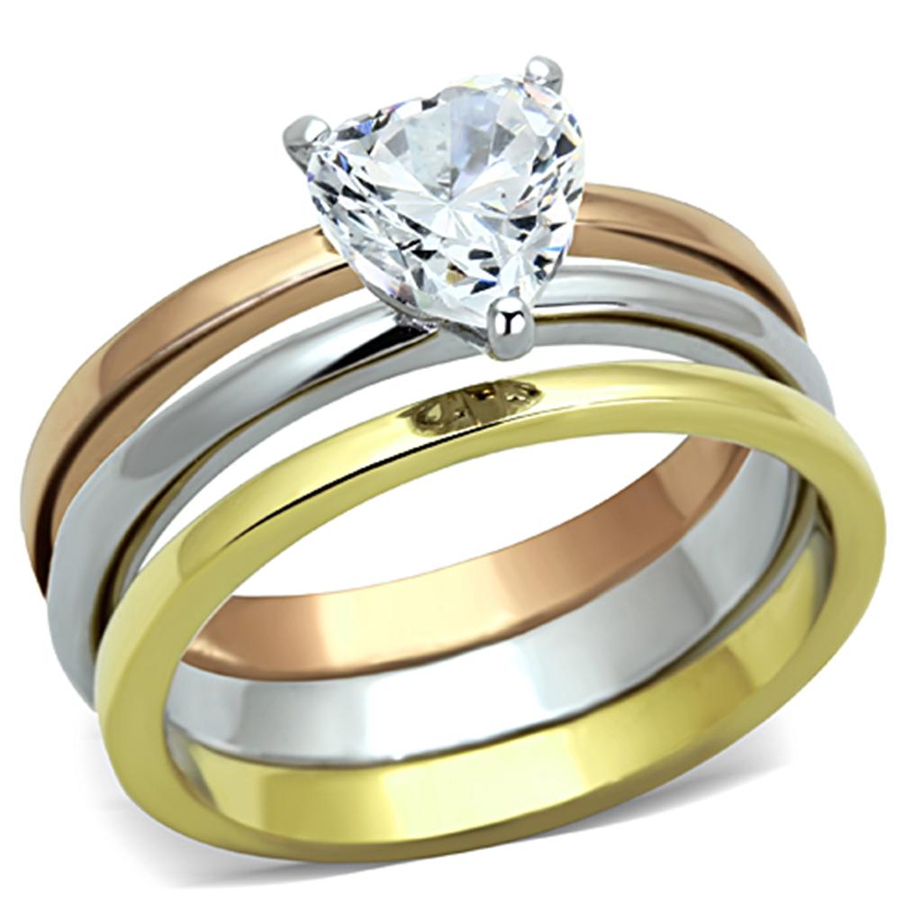 Elegant three-tone stainless steel ring with cubic zirconia stones, showcasing a polished finish.