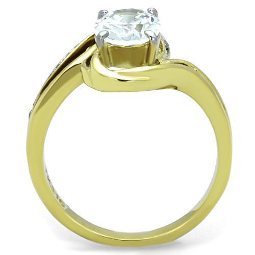 Gold ring with diamond solitaire.