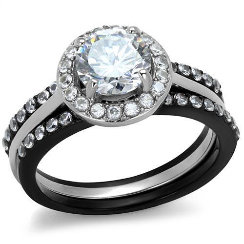 Elegant two-tone stainless steel ring with cubic zirconia stones, showcasing a modern design perfect for women.