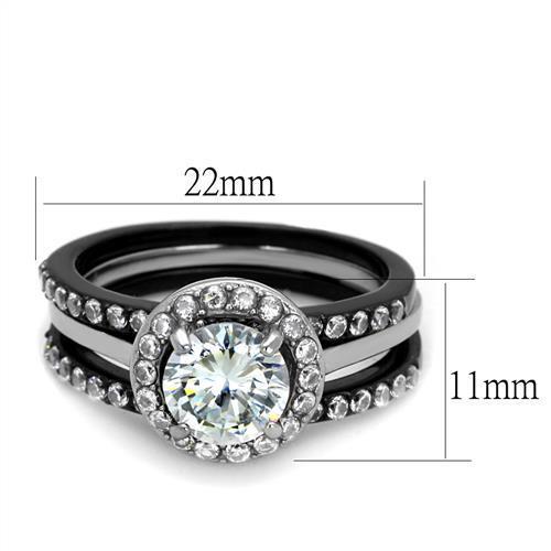 Elegant two-tone stainless steel ring with cubic zirconia stones, showcasing a modern design perfect for women.