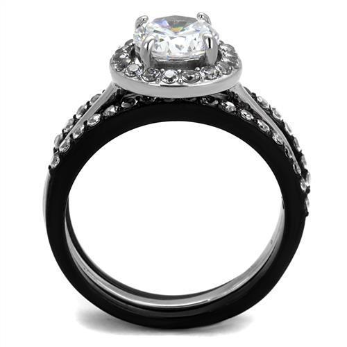 Elegant two-tone stainless steel ring with cubic zirconia stones, showcasing a modern design perfect for women.