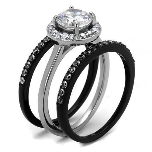 Elegant two-tone stainless steel ring with cubic zirconia stones, showcasing a modern design perfect for women.