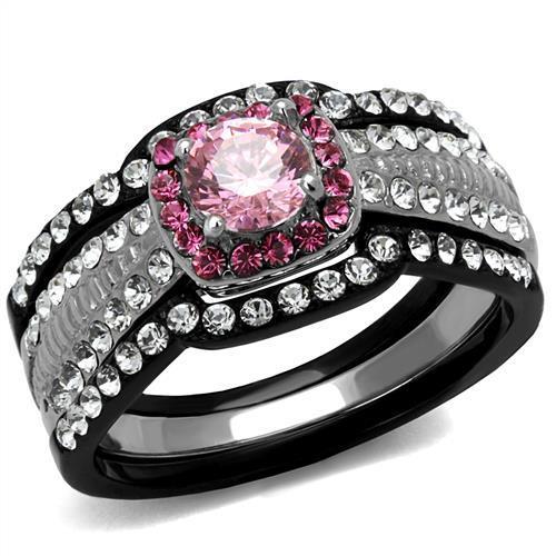 Elegant women’s stainless steel ring featuring two-tone black ion plating and light rose cubic zirconia stones, perfect for any occasion.