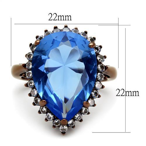 Elegant women’s stainless steel ring with synthetic crystals in light sapphire and pear shape design.