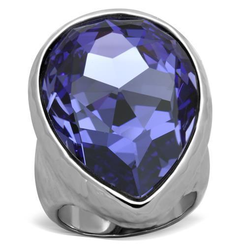 A stylish women's stainless steel ring featuring a high polished finish and a synthetic crystal tanzanite in a pear shape.