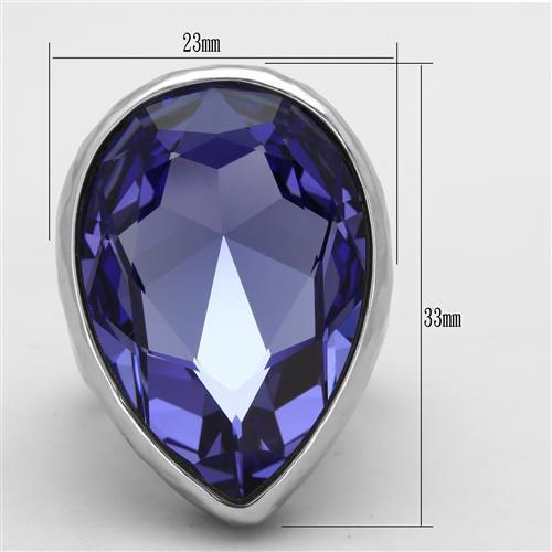 A stylish women's stainless steel ring featuring a high polished finish and a synthetic crystal tanzanite in a pear shape.