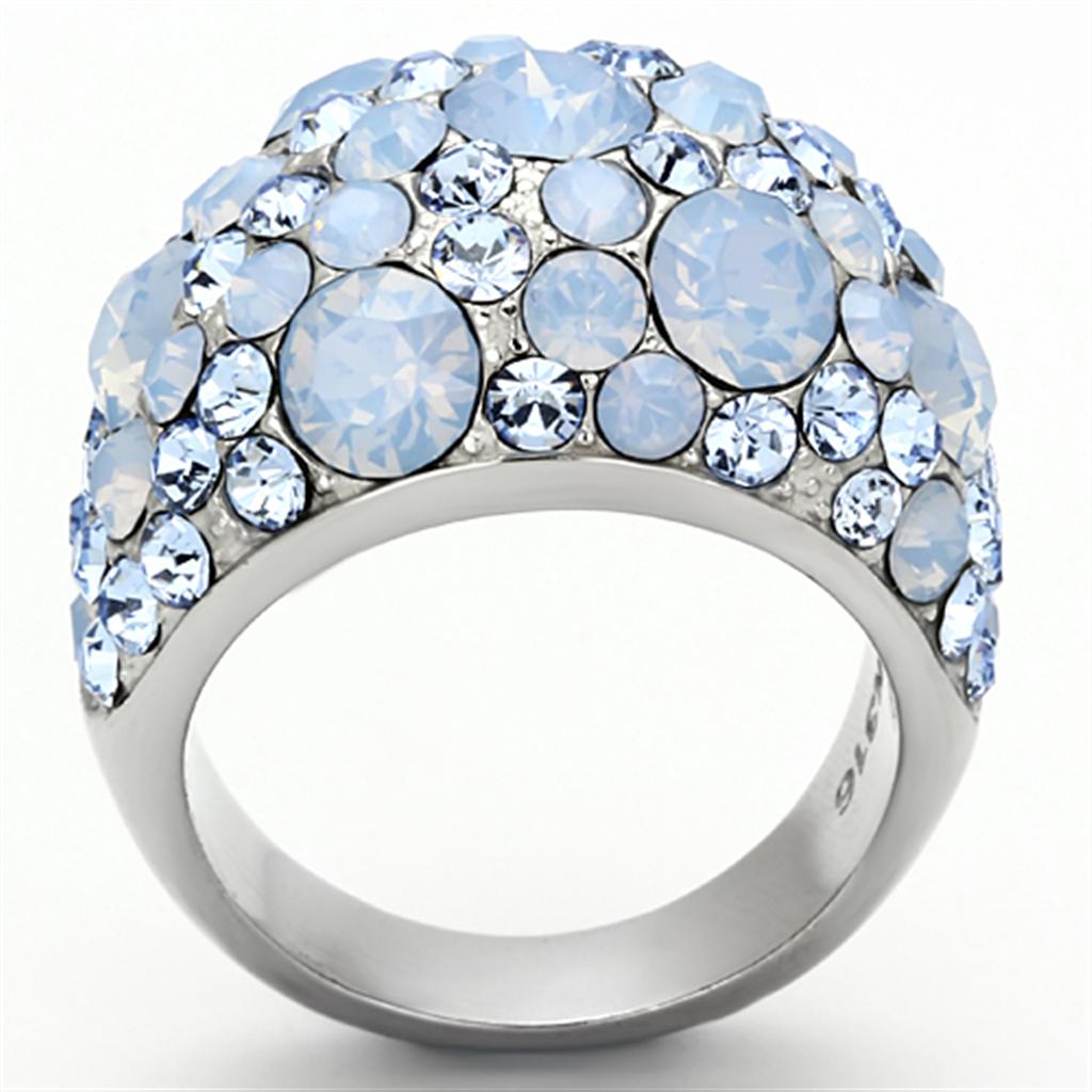 A beautiful women’s stainless steel ring featuring a high polished finish and a vibrant sea blue synthetic crystal centerpiece.