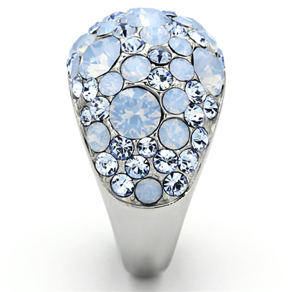 A beautiful women’s stainless steel ring featuring a high polished finish and a vibrant sea blue synthetic crystal centerpiece.