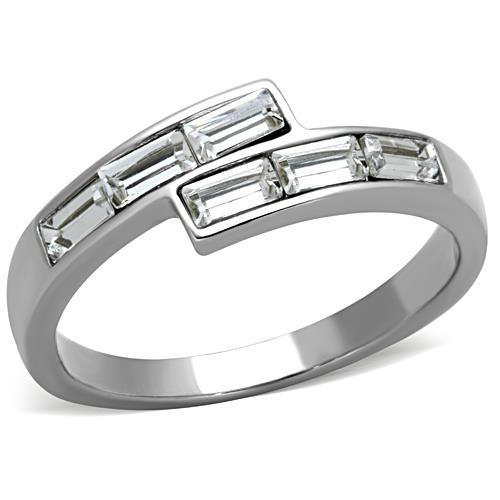 A collection of women's stainless steel rings featuring high-polished finishes and clear synthetic crystals, showcasing elegance and durability.