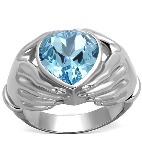 A beautiful women’s stainless steel ring featuring a high polished finish and a stunning sea blue synthetic crystal centerpiece.