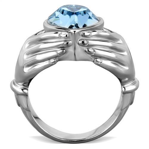 A beautiful women’s stainless steel ring featuring a high polished finish and a stunning sea blue synthetic crystal centerpiece.