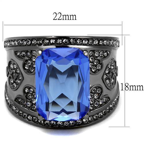 A stylish women's stainless steel ring featuring a synthetic crystal and sapphire in an oblong shape with an IP light black finish.