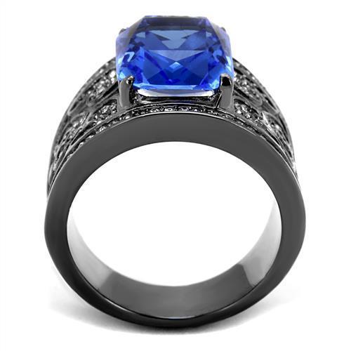 A stylish women's stainless steel ring featuring a synthetic crystal and sapphire in an oblong shape with an IP light black finish.