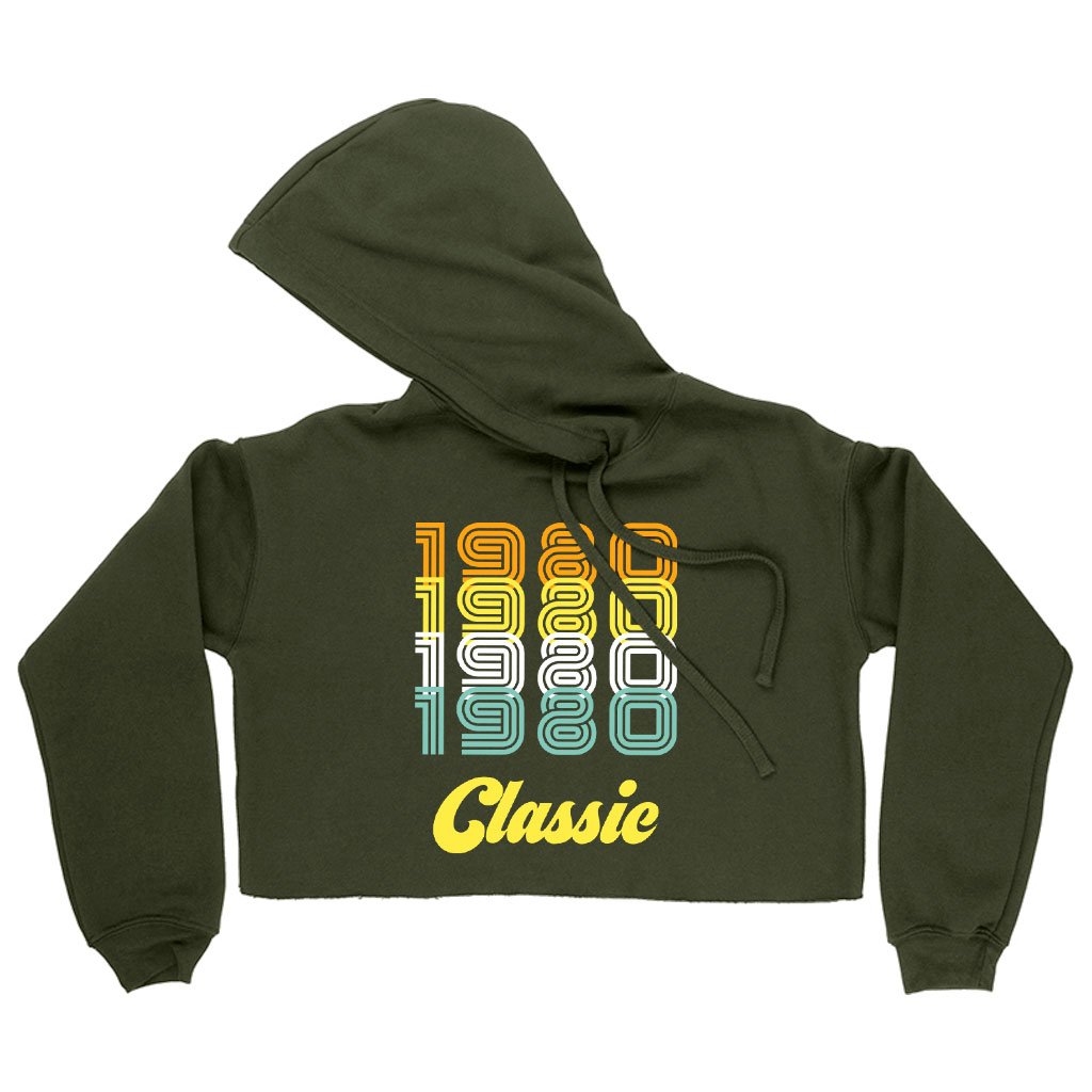 Women's Cropped Fleece 1980 Classic Hoodie in a stylish cropped design, showcasing its soft fleece material and relaxed fit.