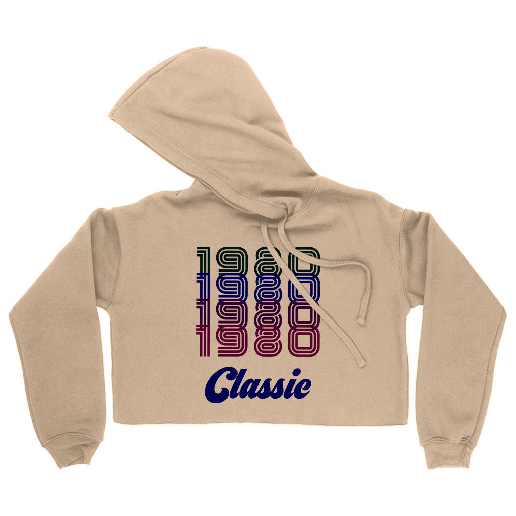 Women's Cropped Fleece 1980 Classic Hoodie in a stylish cropped design, showcasing its soft fleece material and relaxed fit.