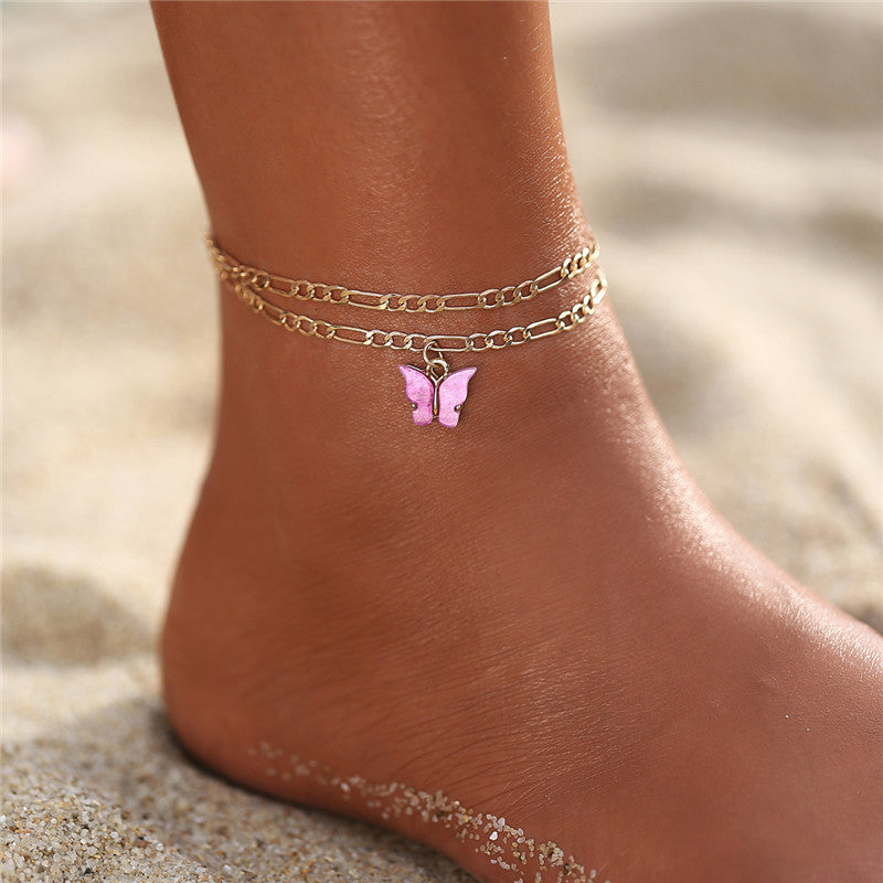 Elegant Women's Summer Anklet in 18K gold plating with gemstones, showcasing its adjustable design and luxurious shine.