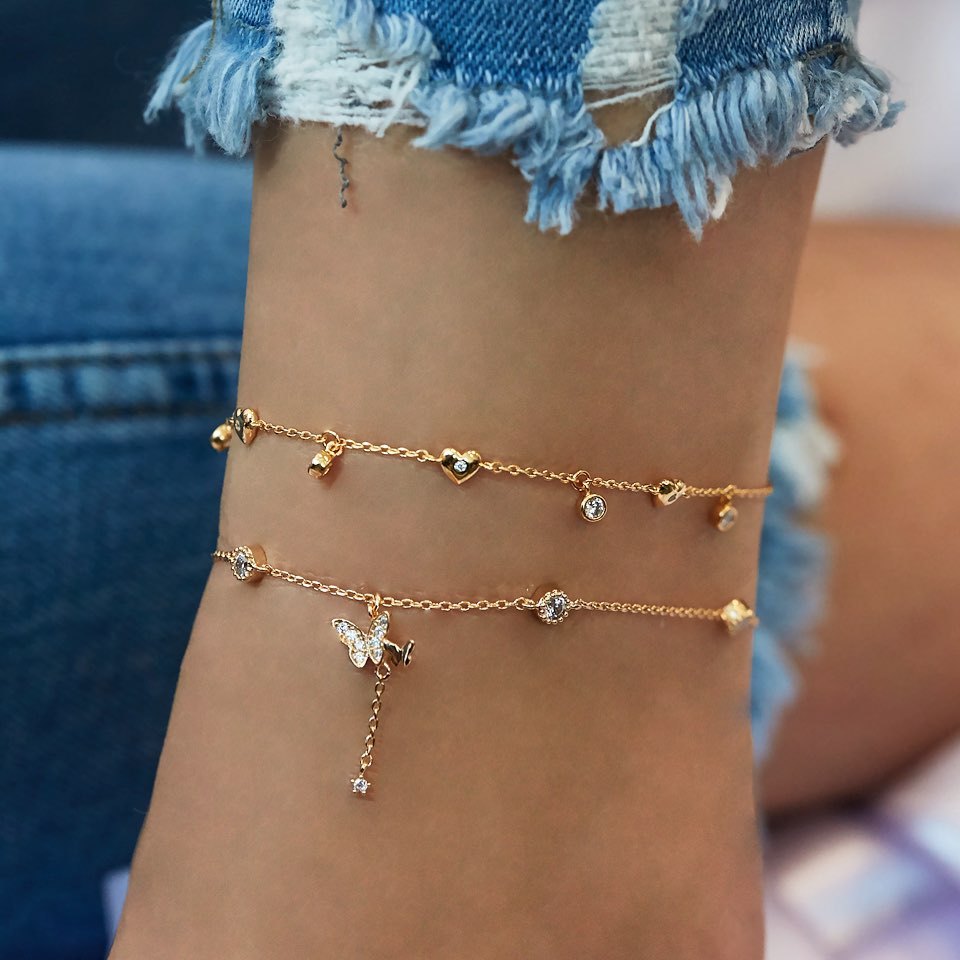 Elegant Women's Summer Anklet in 18K gold plating with gemstones, showcasing its adjustable design and luxurious shine.