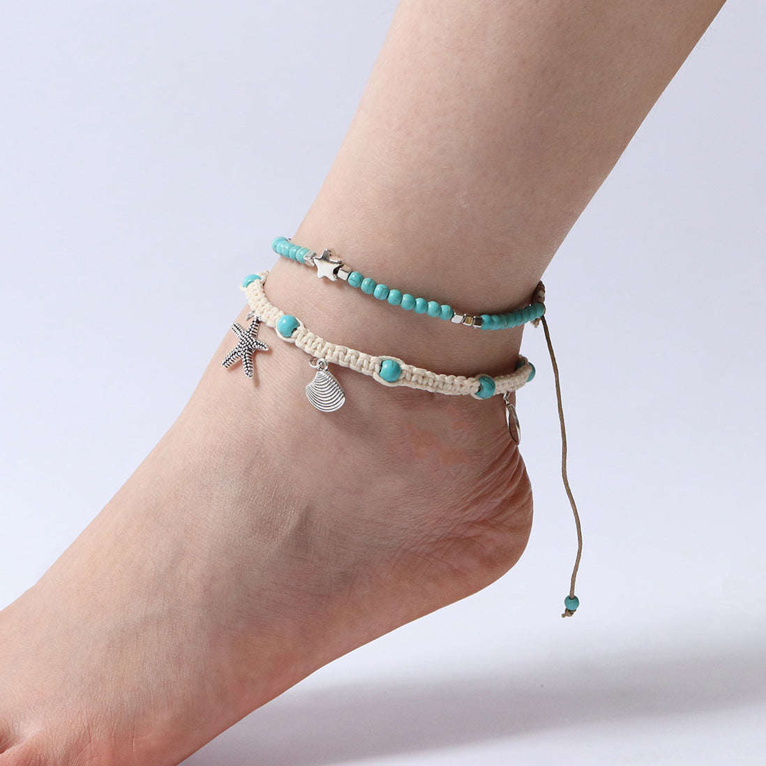 Elegant Women's Summer Anklet in 18K gold plating with gemstones, showcasing its adjustable design and luxurious shine.