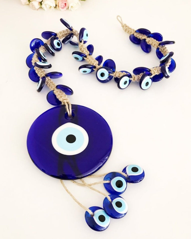 X-Large evil eye wall hanging featuring 41 unique beads, including a large 13cm bead and 40 smaller glass beads, beautifully handcrafted.