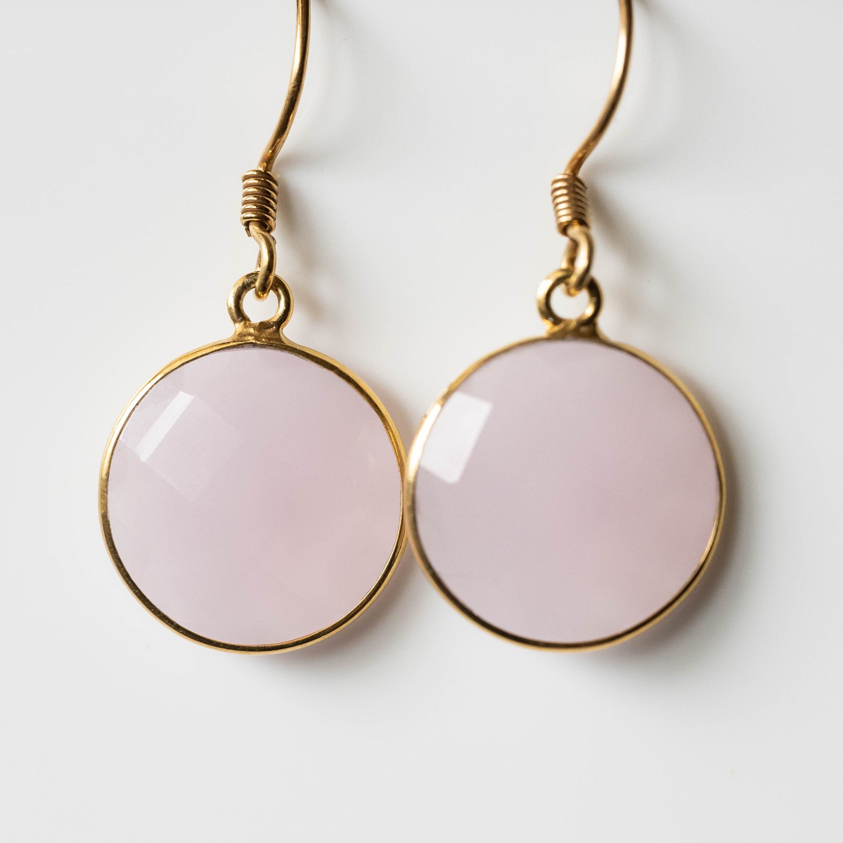 Yani Rose Quartz Round Earrings featuring gold-plated settings and 14k gold-filled ear wires, showcasing beautiful rose quartz stones.