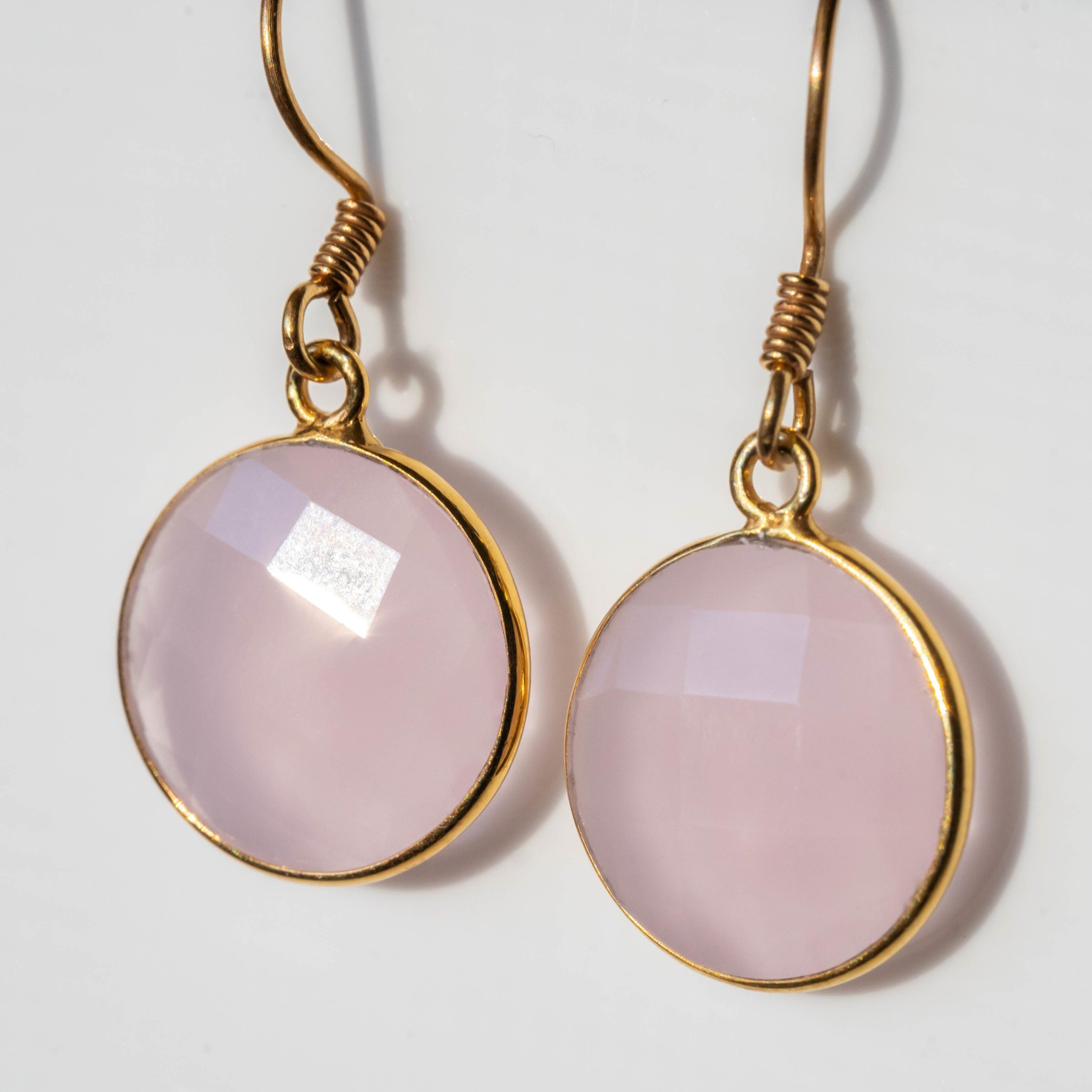 Yani Rose Quartz Round Earrings featuring gold-plated settings and 14k gold-filled ear wires, showcasing beautiful rose quartz stones.