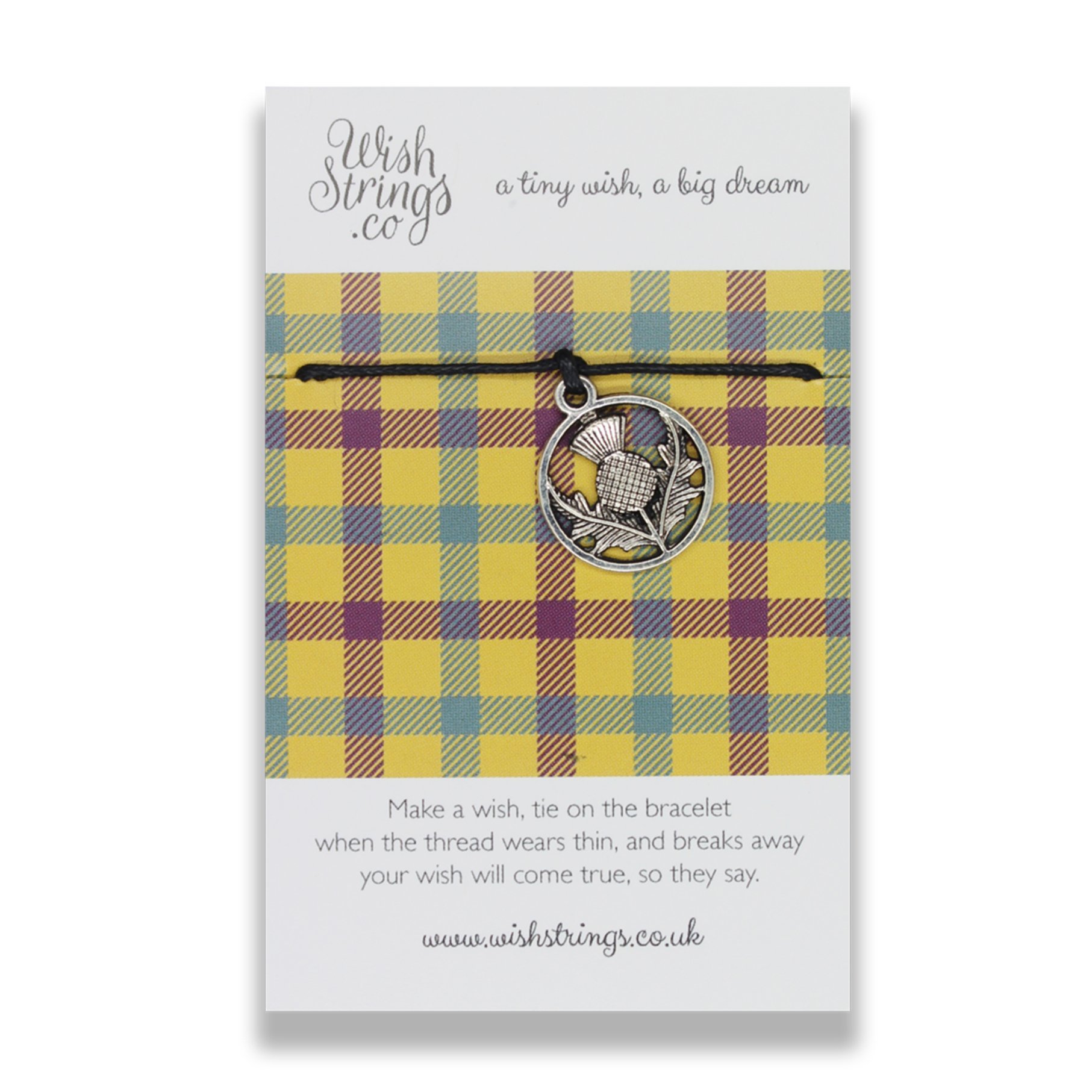 A handmade YELLOW TARTAN HEART WishStrings bracelet featuring a Tibetan Silver charm on a waxed cotton cord, presented on a luxury display card.