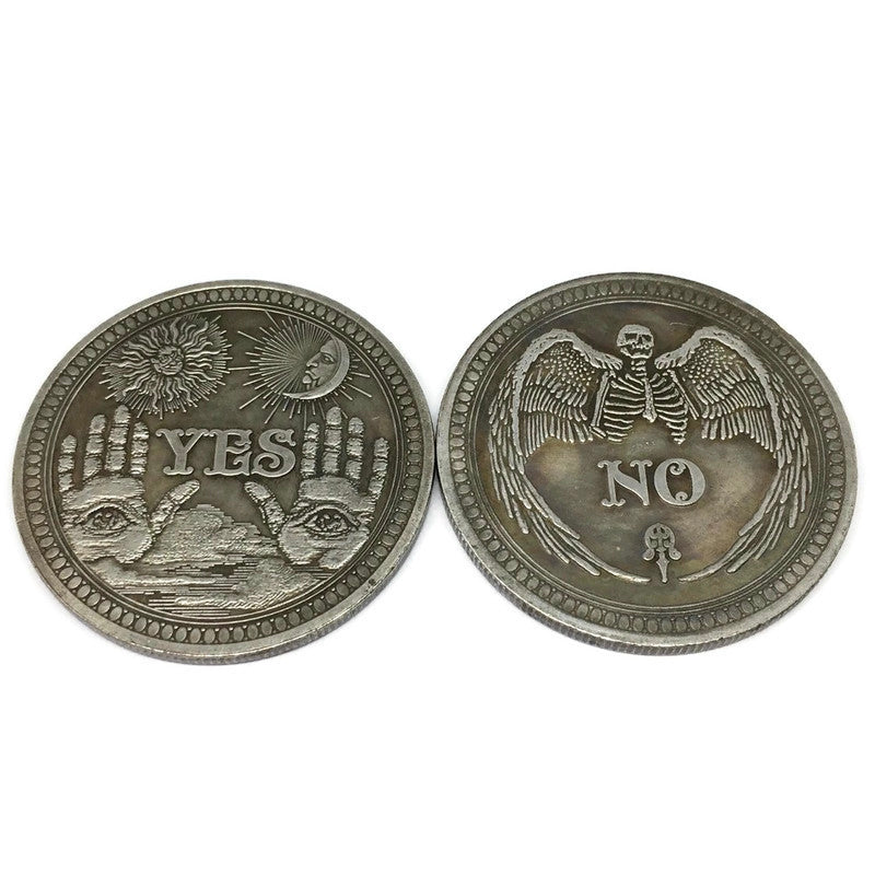 A shiny steel alloy Yes / No Mystic Fortune Coin, measuring 3.8 x 3.8cm, featuring clear 'Yes' and 'No' inscriptions on each side.