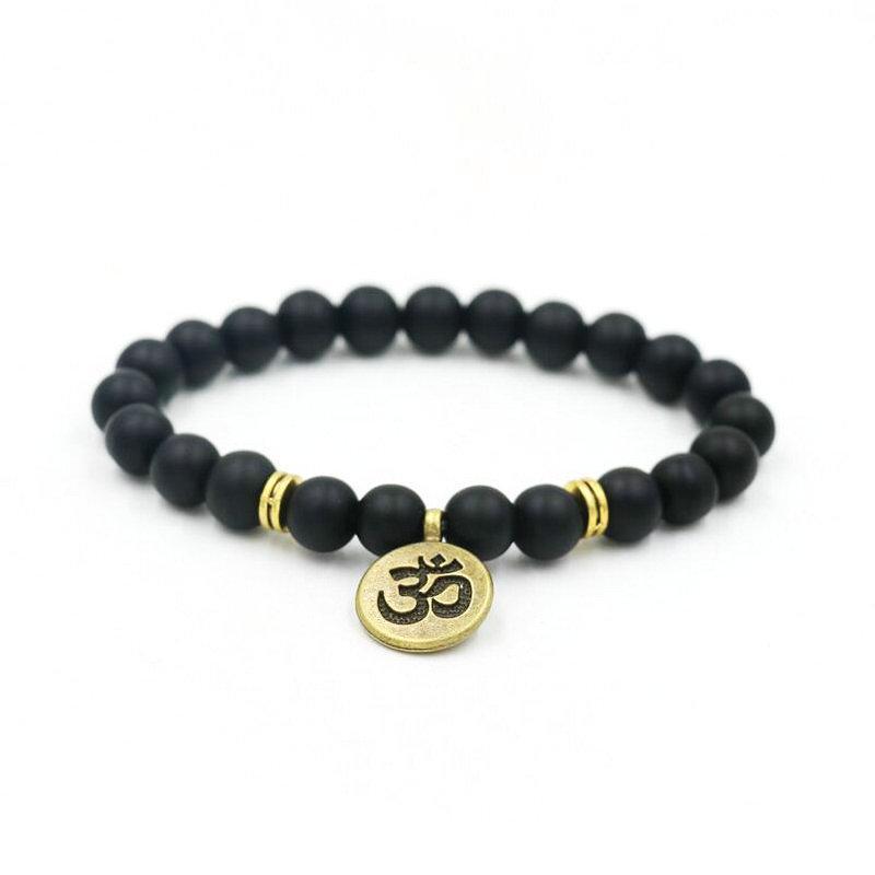 Yoga Bracelets featuring black beaded natural agate stones with lotus flower and Om symbol charms, elegantly designed for spiritual healing.